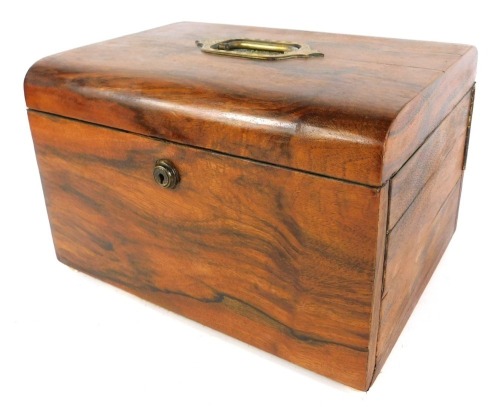 A Victorian walnut jewellery box, with an inset engraved brass handle to the hinged lid, the interior lined in leather and fitted with velvet hinged compartments and with a Bramah lock, 30cm wide.