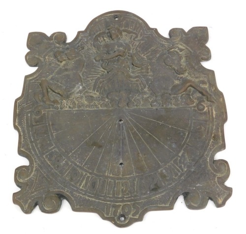 A 20thC cast iron sundial, raised with a figure of Apollo making his daily journey, on chariot drawn by horses, with Arabic numerals bearing the date 1705, 15cm high.