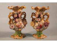 A pair of 19thC Coalbrookdale porcelain two handled pedestal vases of baluster shape
