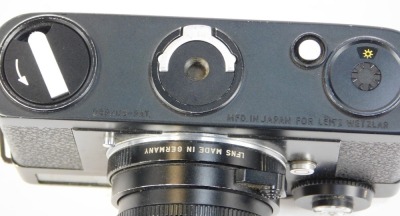 A Leica CL camera, No 1332106 with 40mm F2 Summicron C lens, No 2635027. - 3