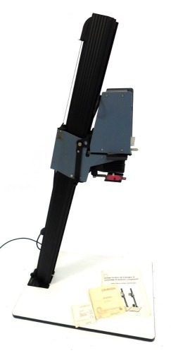 An Omega enlarger, 35mm, 6 x 6 model, P66 Serial No 2317, 124cm high. (AF) Buyer Note: WARNING! This lot contains untested or unsafe electrical items. It is supplied for scrap or reconditioning only. TRADE ONLY