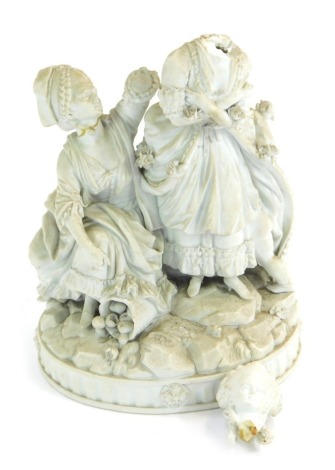 A 19thC Parian figure group, modelled in the form of two ladies, one seated beside a basket of fruit, on a rocky oval base, 22cm high. (AF).