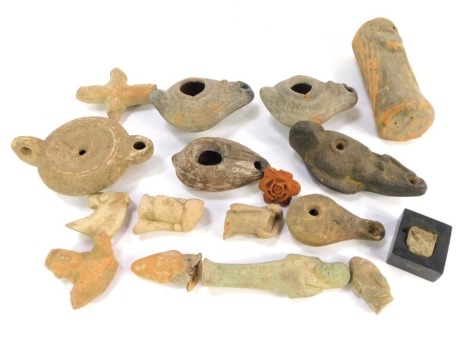 A collection of Roman and other terracotta and earthenware oil lamps, funerary figures, etc., mixture of Roman and Egyptian. Provenance: The Great House Collection, Kegworth. Acquired at auction over 40/50 years ago, sale is unknown. This lot is to be so