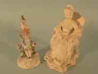 A Victorian porcelain figure of a lady seated whilst holding opera glasses