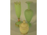 A Victorian green glass bottle shaped vase with gilt rim
