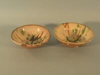 A pair of pottery bowls