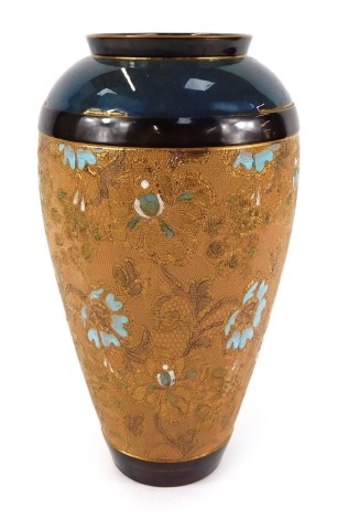 A Royal Doulton Slater's Patent stoneware chine vase, of shouldered, ovoid form, floral decorated against a blue and brown glazed ground, impressed marks, 28cm high.