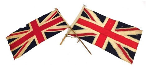 A wall hanging Union Jack flag, and a Union Jack flag on pole. (2)