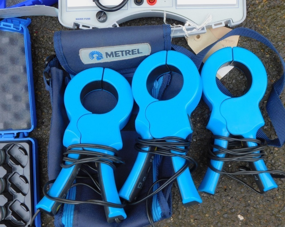 A group of cased power tools and accessories, comprising Metrel A1033,  Transmille testing and calibration 16th