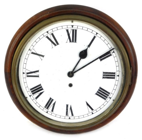 An early 20thC oak cased circular wall clock, with a painted white dial bearing Roman numerals, thirty hour single barrel movement black hands, with pendulum, 40cm diameter.