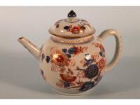 A small Chinese Imari teapot painted with flowering branch decoration