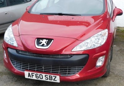 A Peugeot 308 Millesim, Registration AF60 SBZ, five door hatchback, petrol, red, first registered 30/11/2010, V5 present, MOT expired 30/11/20, last known mileage Nov 2019, 29,346 recd miles. - 2