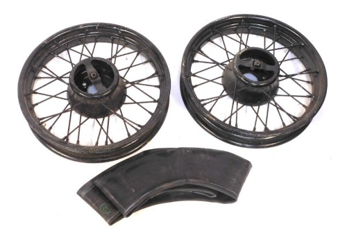 Two 18" bolt on wire spoked wheels, together with an inner tube. (3)