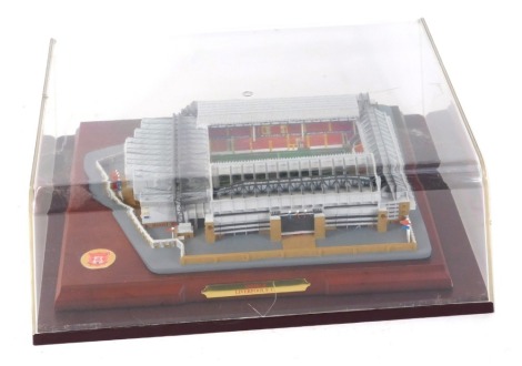 A Danbury Mint Liverpool Football Club official replica of Anfield, with certificate of authenticity number 0767, on plinth with Perspex case, 33cm wide, 29cm deep.