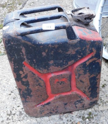 A black steel petrol can.