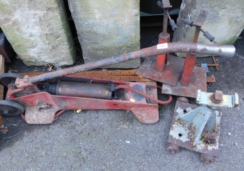 A Kismet-trolley tyre pump, and two supports.