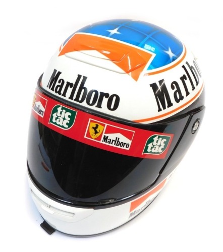 A Shoei 59cm motorcycle helmet, model TXR, with Michael Schumacher Marlboro advertising.