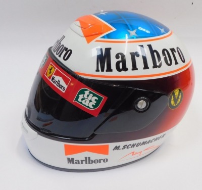 A Shoei 59cm motorcycle helmet, model TXR, with Michael Schumacher Marlboro advertising. - 2