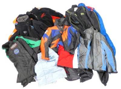 A group of motorcycle leathers, to include a Dainese leather jacket, overalls, etc. (a quantity)