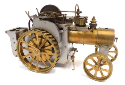 A steam traction engine model, the wheels stamped DPM Engineers, Birmingham, England, 14cm high, 29cm wide.