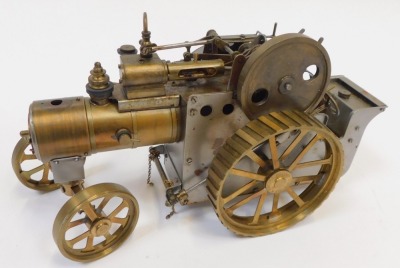 A steam traction engine model, the wheels stamped DPM Engineers, Birmingham, England, 14cm high, 29cm wide. - 2