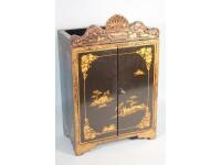 A 19thC Chinese export lacquer table top cabinet with a shell