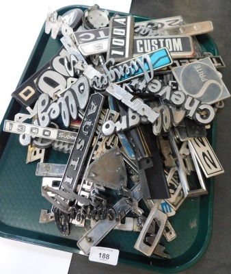 A group of miscellaneous car, van and bike badges, to include Bedford, Avenger, Maxi Princess and others. (1 tray) - 2