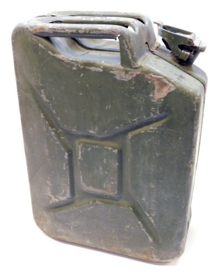 A green metal jerry can, 47cm high.