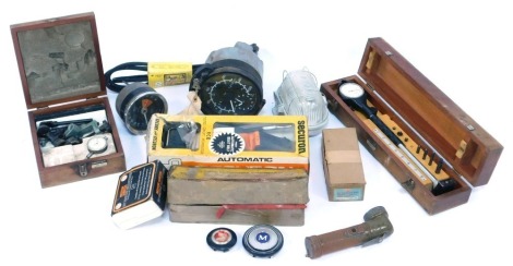 A group of car and automobile parts, to include dials, mini suspension compressor, automatic seat belts, speedo dial, a Smith's motor watch, etc. (1 box)