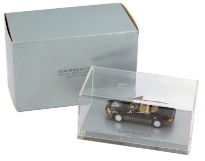 A Mercedes Benz SL Portugal Prasentation 1989 limited edition diecast vehicle, in perspex display case, 17cm wide, boxed.