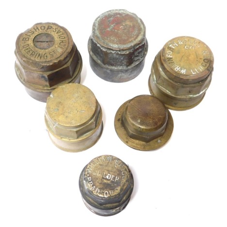 A group of brass wheel nuts, to include stamps such as R Rainforth & Sons Ltd Lincoln, Bishop Deeping St Nicholas, William Briggs Bradford Builder, etc. (6)