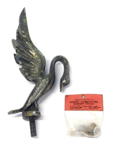 A chrome car mascot, of an arched swan, and a Zenith carburettor, 18cm high.