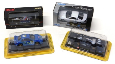 Diecast cars, comprising Welly Ford Mustang GT 1999, a Onyx Lower A1 Unser Junior, 1:43 scale 2000 Subaru Impreza WRC and a 1:43 scale Ford GT MKII. (4)