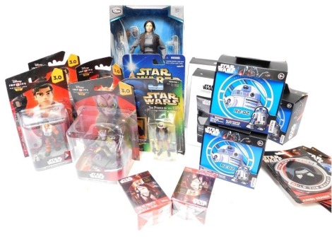 Star Wars memorabilia and figures, to include Disney Infinity Poe-Dameron and Zeb Orrelios, R2-D2 shaped 250 piece jigsaw, Star Wars Stormtrooper gift set, Star Wars jumbo erasers, and The Disney Store Elite Series Sergeant Jyn Erso. (1 tray)