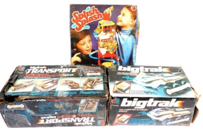 Toys and games, including MB Electronics Big Track Transport, MB Electronics Big Track, and Peter Pan Play Things Splish Splash. (3)