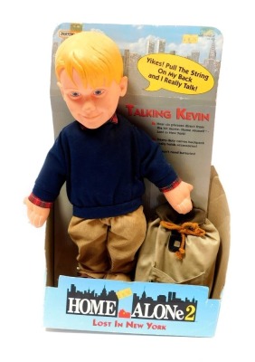 A Matchbox Home Alone Lost in New York talking Kevin, boxed, with accessories. (AF)