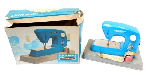 A Debutant Little Betty miniature sewing machine, boxed.