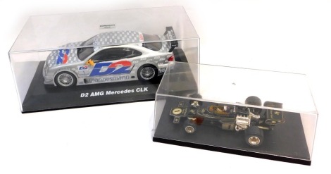 A diecast D2 AMG Mercedes CLK, in case, and a Corgi John Player Special F1 diecast car, in case. (2)