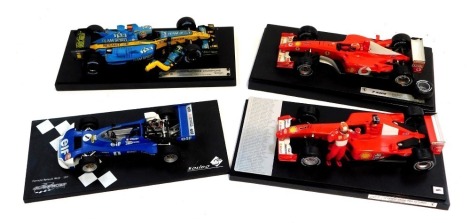 Seledo and Hot Wheels diecast F1 cars, including 2005 Champions Renault F1 Team, Formula Renault Mark 20 1977 Alain Prost, F2002 Michael Schumacher, and a 52 Grand Prix Victories Ferrari Michael Schumacher. (4)