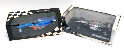 A Minichamps 1:18 scale diecast Benetton B198 A Wort, and a Hot Wheels Racing McLaren MP4-20 Kimi Raikkonen. (2)