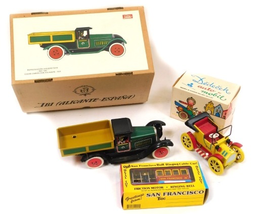 A tinplate San Francisco friction motor bell ringing cable car, a Paya tinplate clockwork truck, and a Czechoslovakia tinplate Dedecek automobile tinplate car. (3)