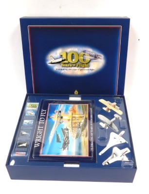 A Corgi Showcase Collection limited edition 100 Years of Flight diecast models, including a Wright Flyer, Spitfire, Concorde, and Space Shuttle, boxed.