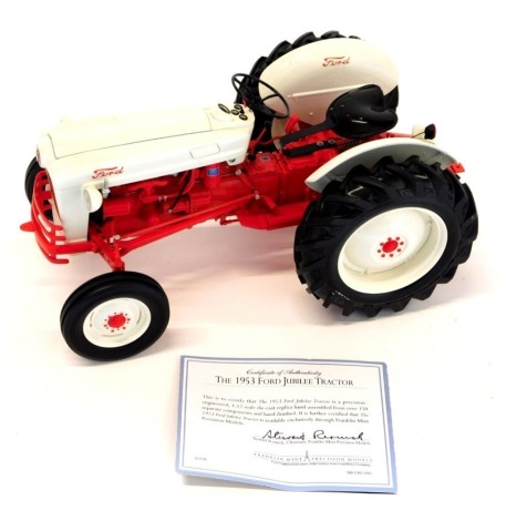 A Franklin Mint 1953 Ford Jubilee tractor, in original box with leaflet/certificate.