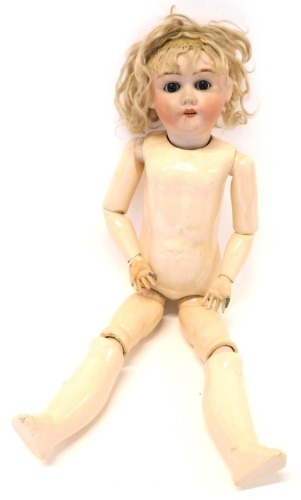 A Max Handwerck German bisque headed doll, with plaster articulated limb body, with rolling eyes, blonde hair, stamped to head, No 2 1/4.