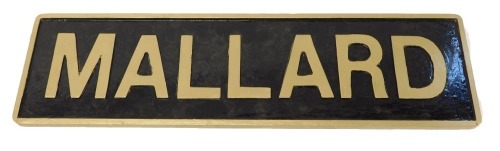 A Mallard railway engine sign, painted wooden on black ground with gold lettering, 65cm x 18cm.