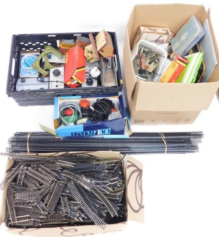 A group of railway accessories, comprising buildings, OO gauge track, transformers, etc. (a quantity)