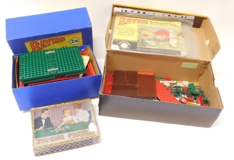 Bayko 2X converting set, boxed, Bayko building sets, and a zigzag puzzle. (3)