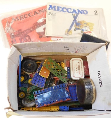 Meccano, including Meccano set 2 Book of Models, Meccano instructions for Outfit 0, wheels, pieces, etc. ( 1 box)