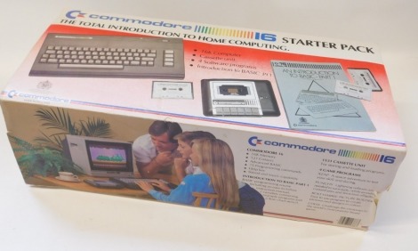 A Commodore 16 starter pack, including 16k computer cassette unit, an Introduction to Basic Part 1, boxed.