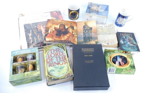 Lord of the Rings memorabilia, to include The Lord of the Rings hardback book, shot glass pack, mug, calendars, limited edition Shaman's Crossing book, etc. (1 box)